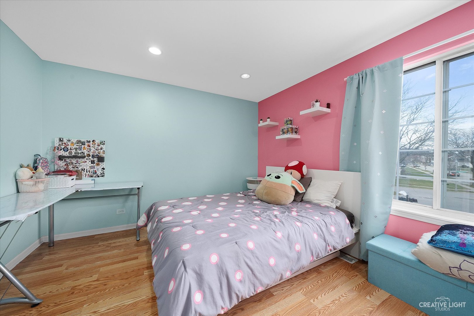 1369 Spaulding Road Bartlett, IL 60103 - Photo 12 of 15 a bedroom with a bed and a wooden floor