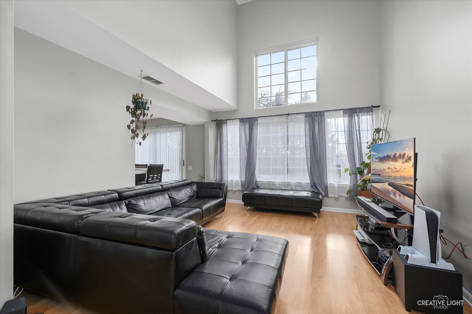 1369 Spaulding Road Bartlett, IL 60103 - Photo 2 of 15 a living room with furniture and a flat screen tv