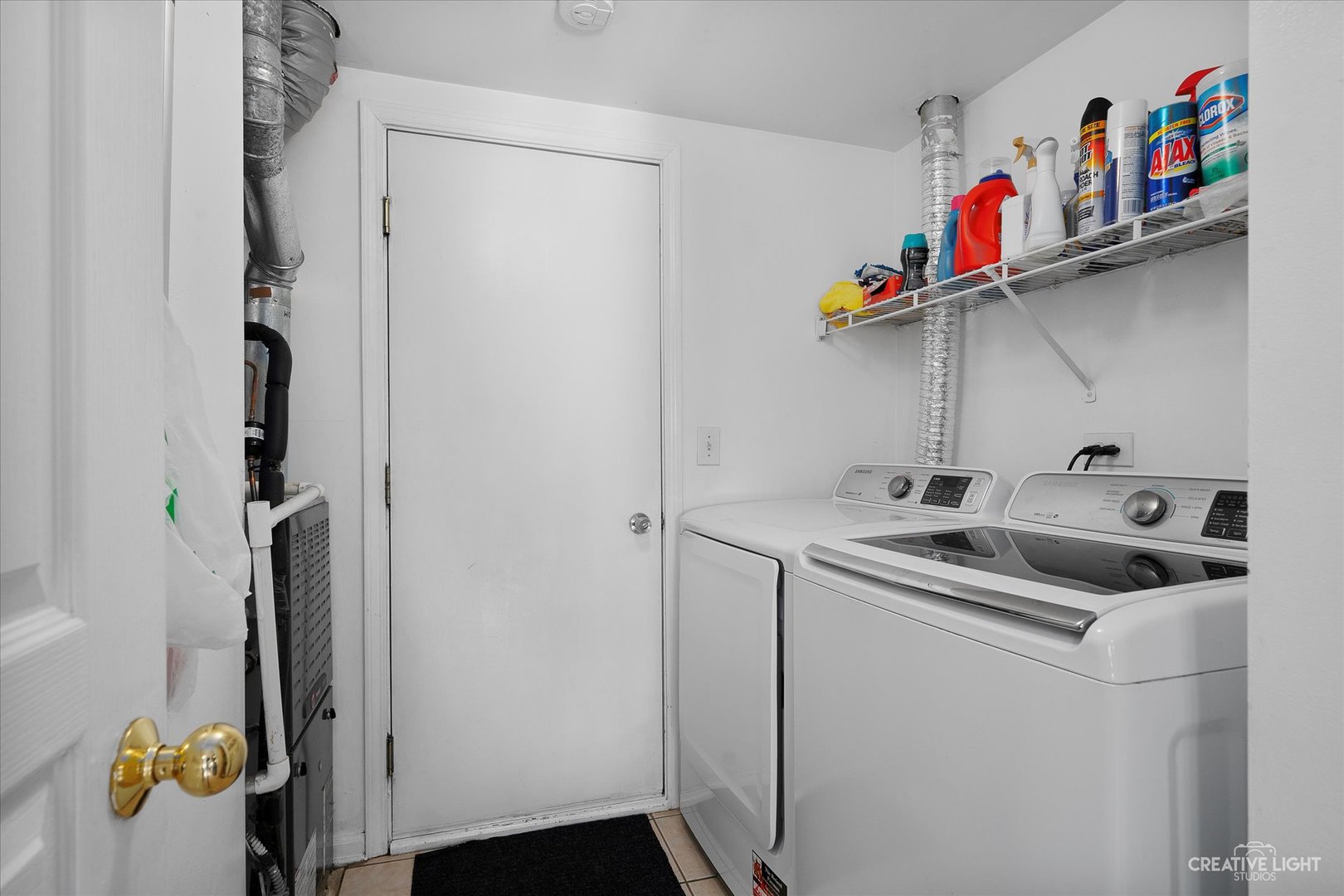 1369 Spaulding Road Bartlett, IL 60103 - Photo 8 of 15 a utility room with dryer and washer