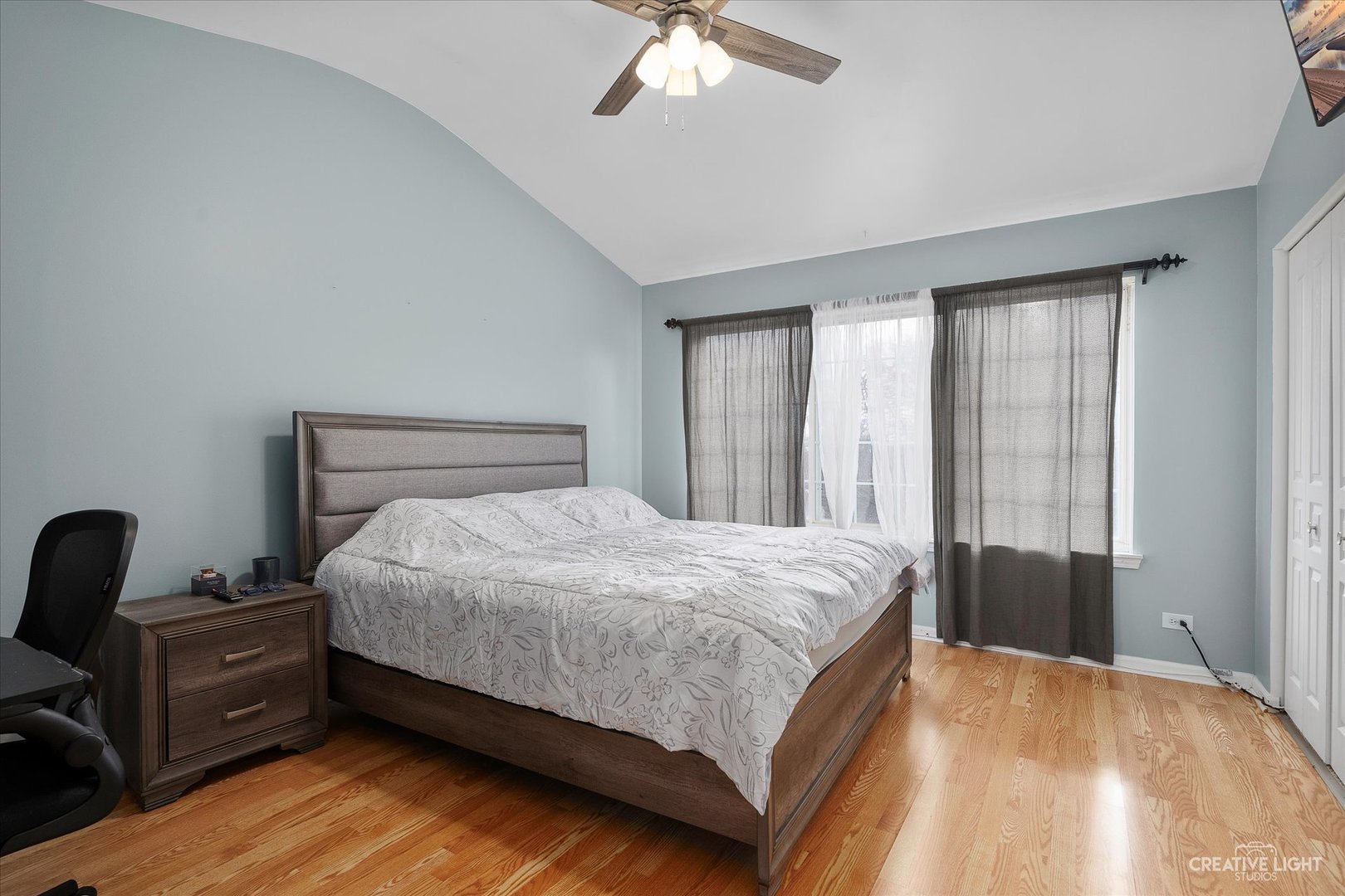 1369 Spaulding Road Bartlett, IL 60103 - Photo 9 of 15 a bedroom with a bed and wooden floor