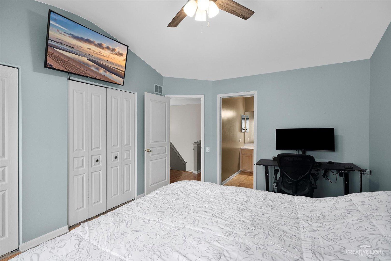1369 Spaulding Road Bartlett, IL 60103 - Photo 10 of 15 a bedroom with a bed and a flat tv screen on dresser