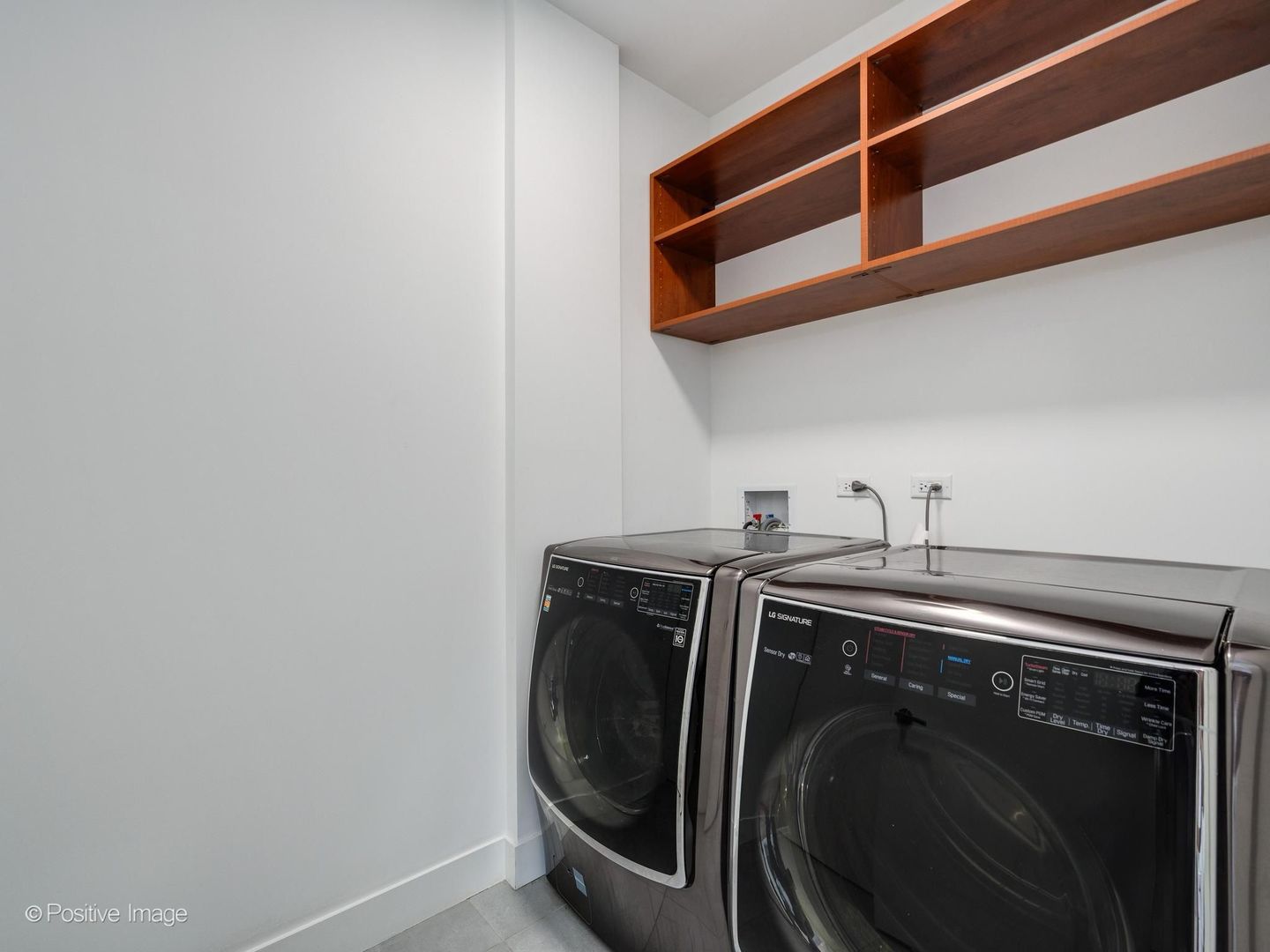 305 South Racine Avenue, Unit 2A Chicago, IL 60607 - Photo 25 of 29 a utility room with dryer and washer