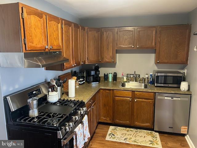 948 Easter Road Burlington, NJ 08016 - Photo 11 of 30 a kitchen with a stove and a sink