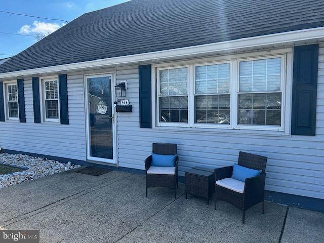 948 Easter Road Burlington, NJ 08016 - Photo 5 of 30 a front view of a house with a bench