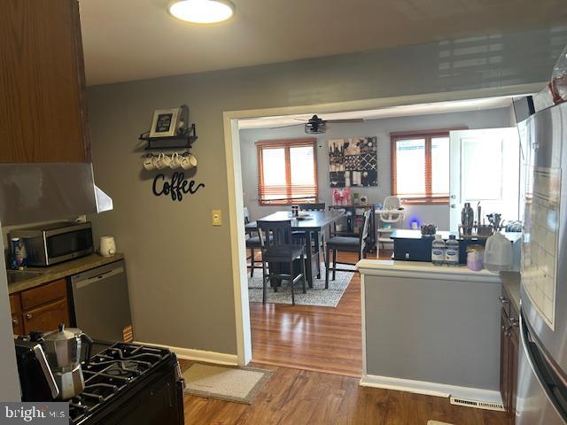 948 Easter Road Burlington, NJ 08016 - Photo 10 of 30 a kitchen with a sink stove and cabinets