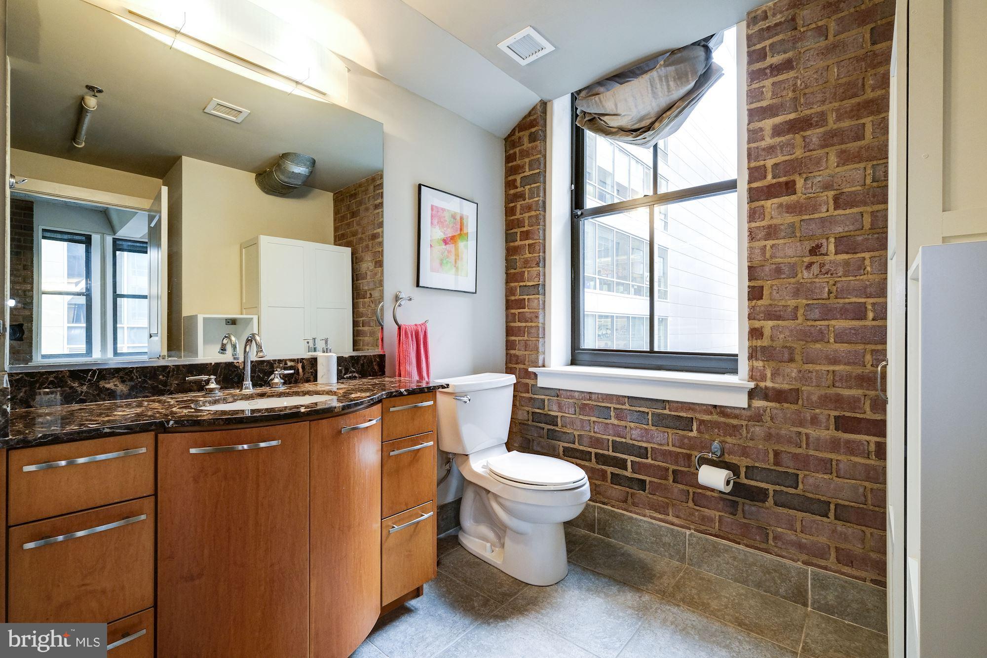 916 G St. Northwest, Unit 403 Washington, DC 20001 - Photo 12 of 14 Large Vanity with Storage