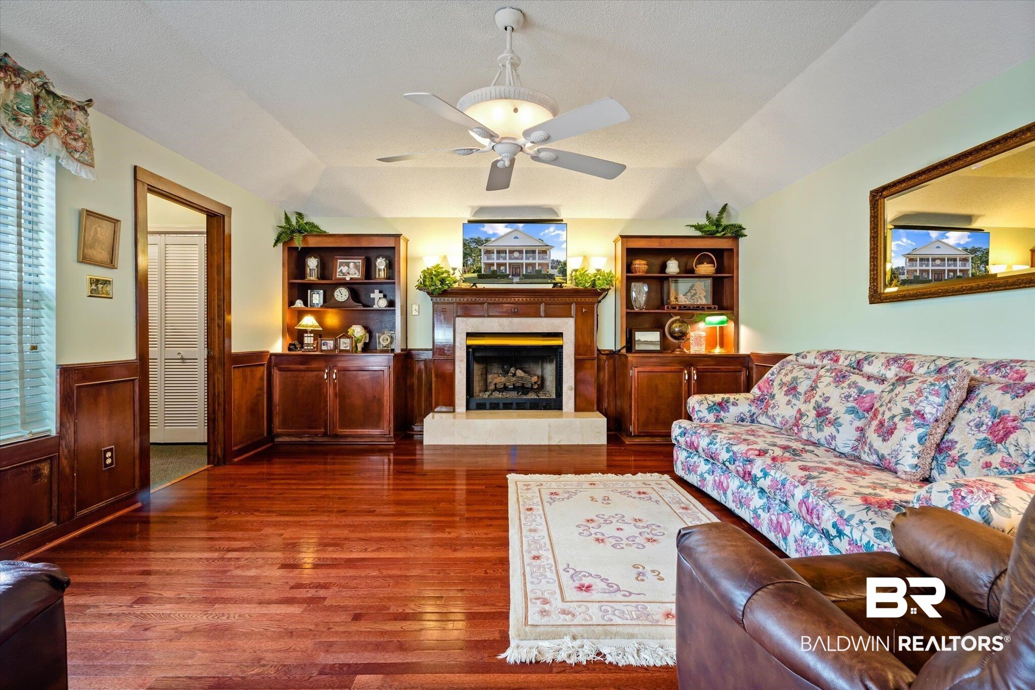 3837 St Andrews Loop East Mobile, AL 36693 - Photo 9 of 22 Den with hardwood floors
