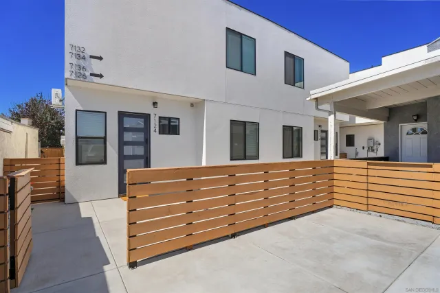 a porch with glass door and glass door