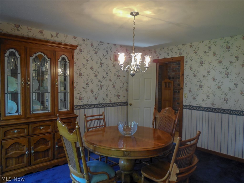 94 Hurd Road Aurora, OH 44202 - Photo 3 of 12 Dining room is located to the left upon entering the home with direct access to the kitchen. Again tons of natural light.