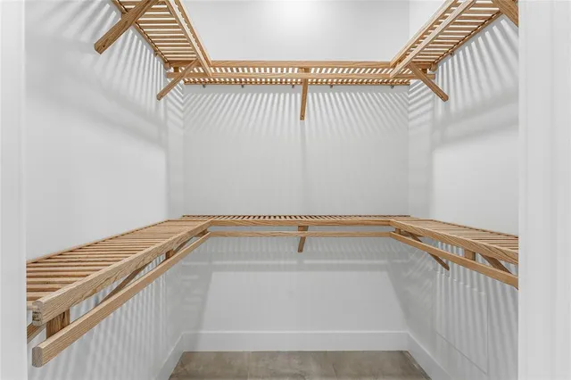 a view of a room with racks on the wall