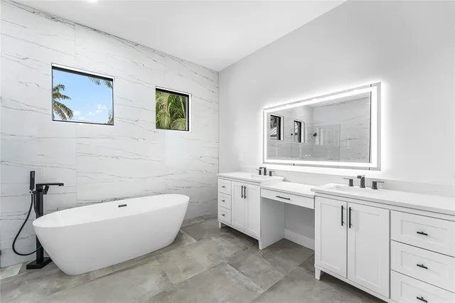 a bathroom with a sink and a bathtub