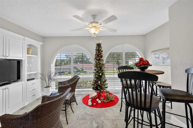 a workspace with furniture window and outside view