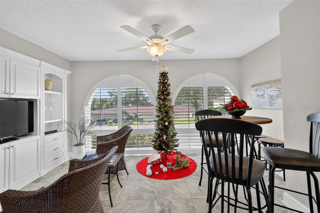 100 South Tremain Street, Unit F1 Mount Dora, FL 32757 - Photo 16 of 47 a workspace with furniture window and outside view
