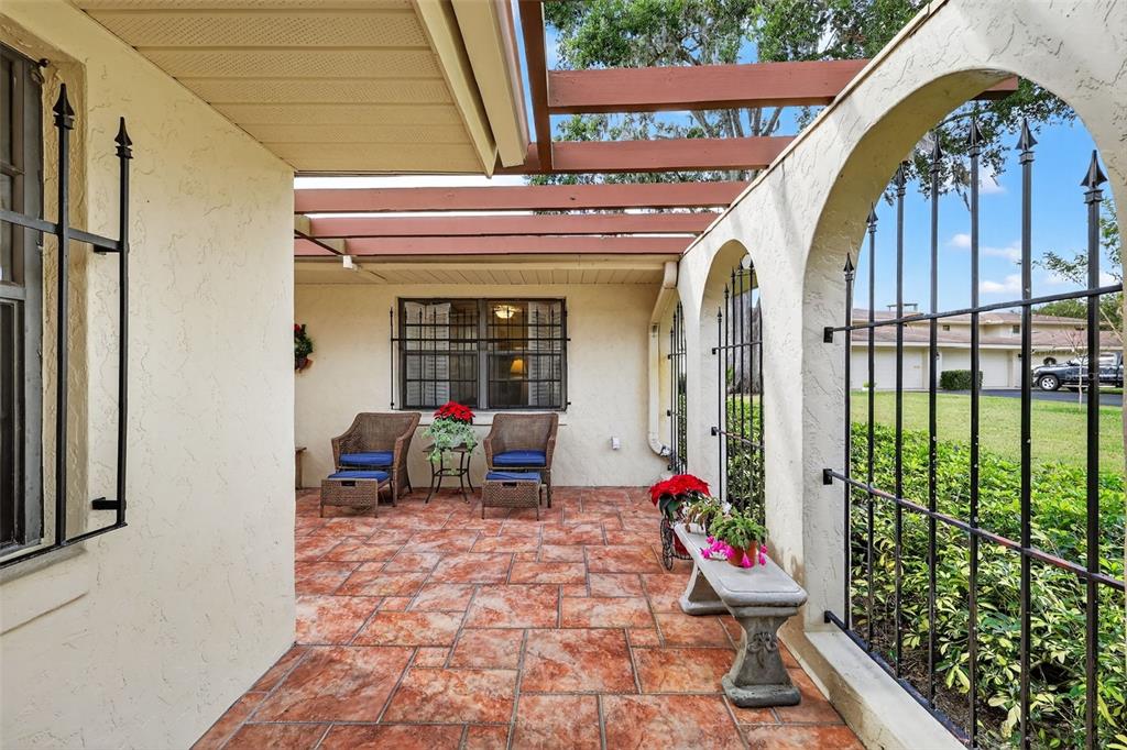 100 South Tremain Street, Unit F1 Mount Dora, FL 32757 - Photo 3 of 47 a view of a entryway door of the house