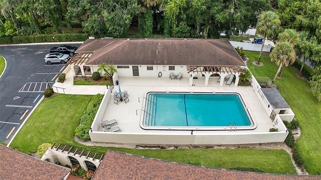 100 South Tremain Street, Unit F1 Mount Dora, FL 32757 - Photo 35 of 47 a view of a house with a yard