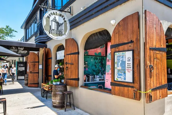 an outdoor space with furniture and chandelier