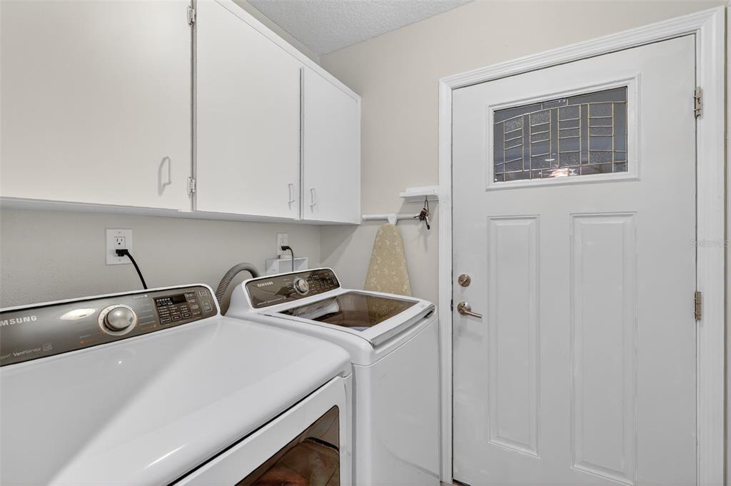 100 South Tremain Street, Unit F1 Mount Dora, FL 32757 - Photo 8 of 47 a room with storage and utility