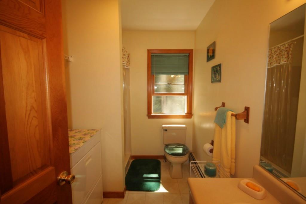 14 Schooner Ridge Road East Boothbay, ME 04544 - Photo 18 of 29 The first floor bathroom, with...