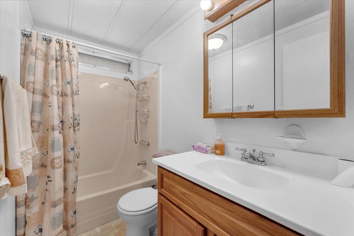 350 Gilmore Road Red Bluff, CA 96080 - Photo 21 of 27 a bathroom with a sink a toilet and shower