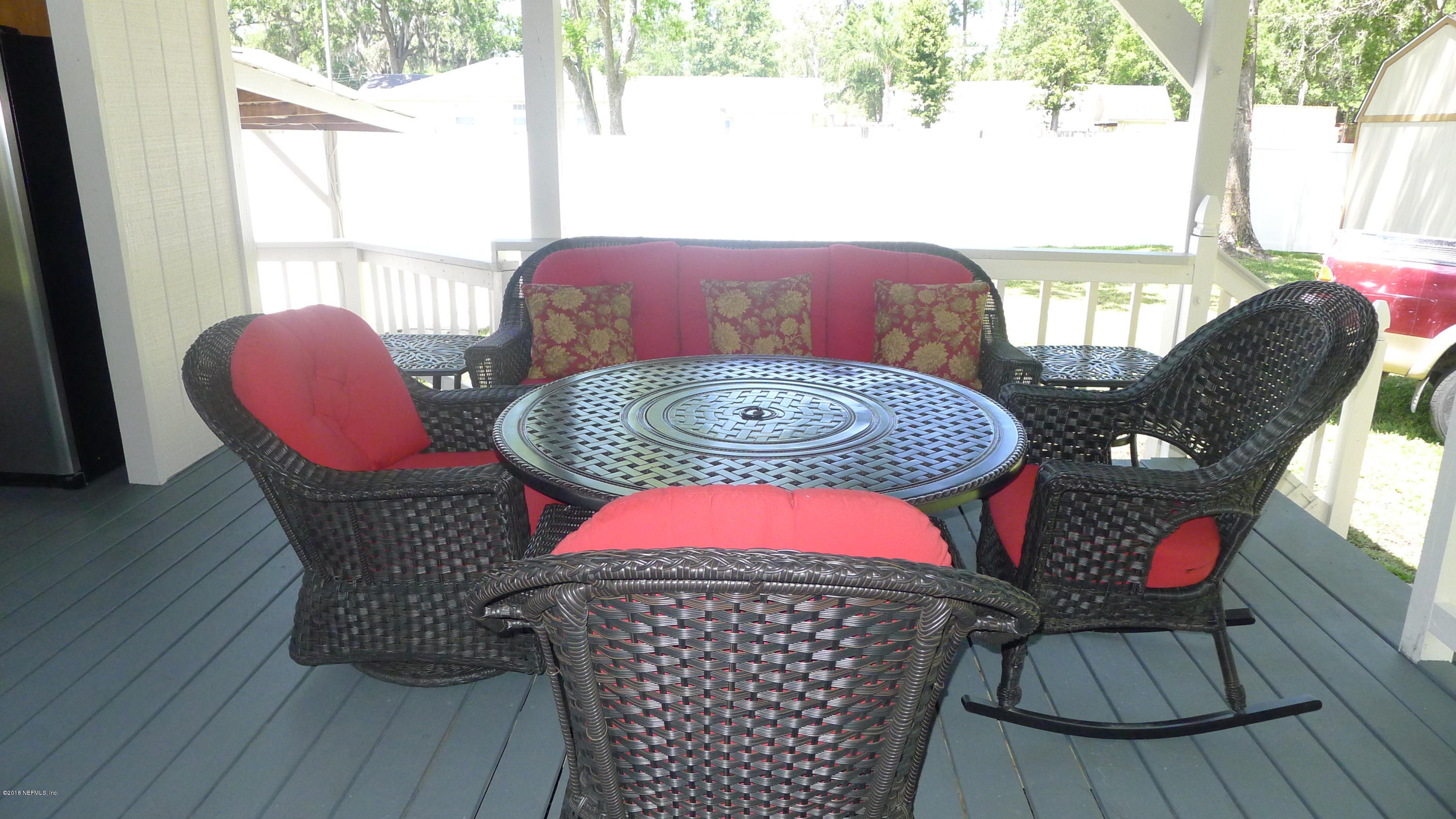 1923 W Road Jacksonville, FL 32216 - Photo 13 of 45 relax on the covered deck