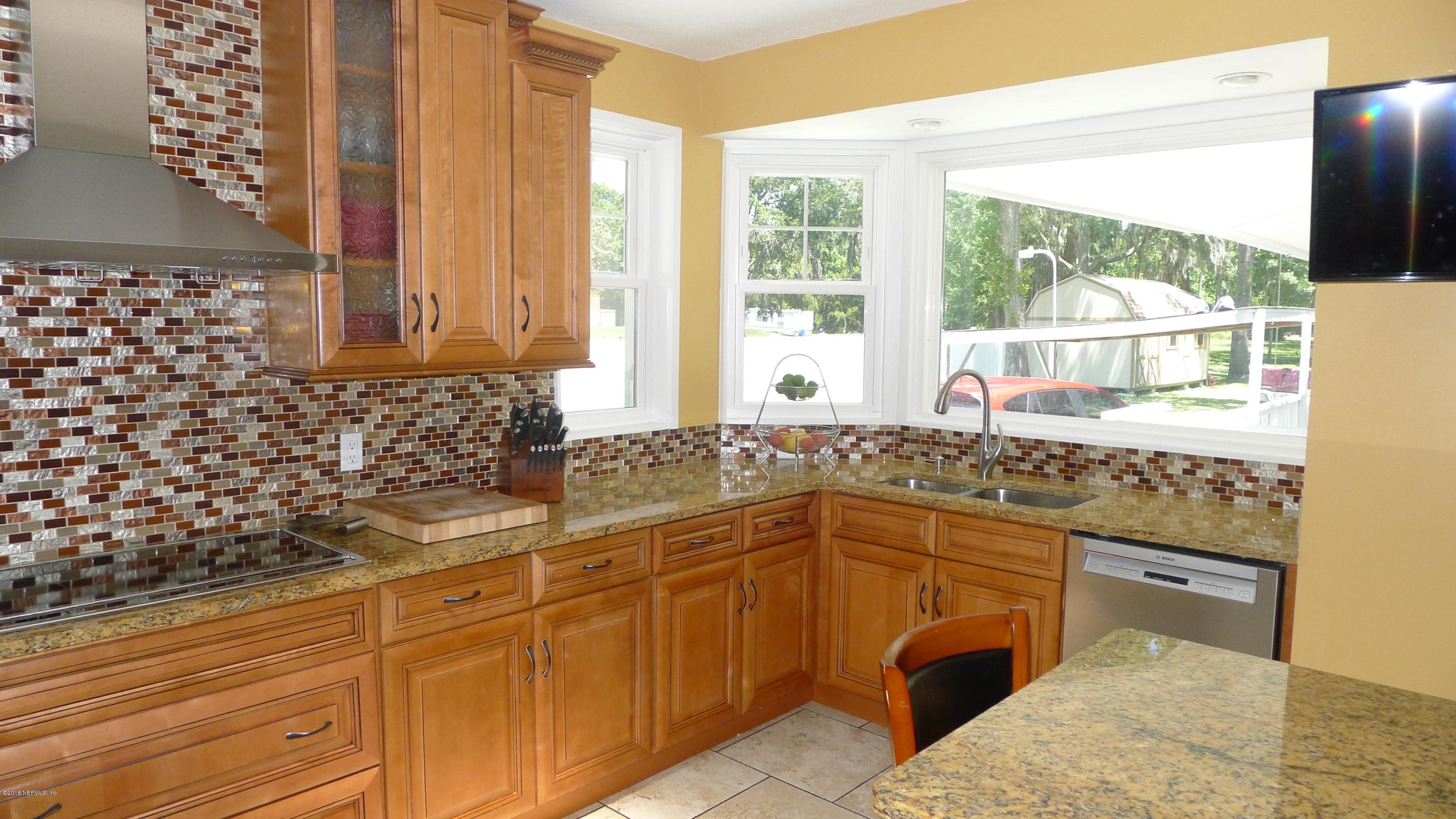 1923 W Road Jacksonville, FL 32216 - Photo 19 of 45 overlook the party while in the kitchen!