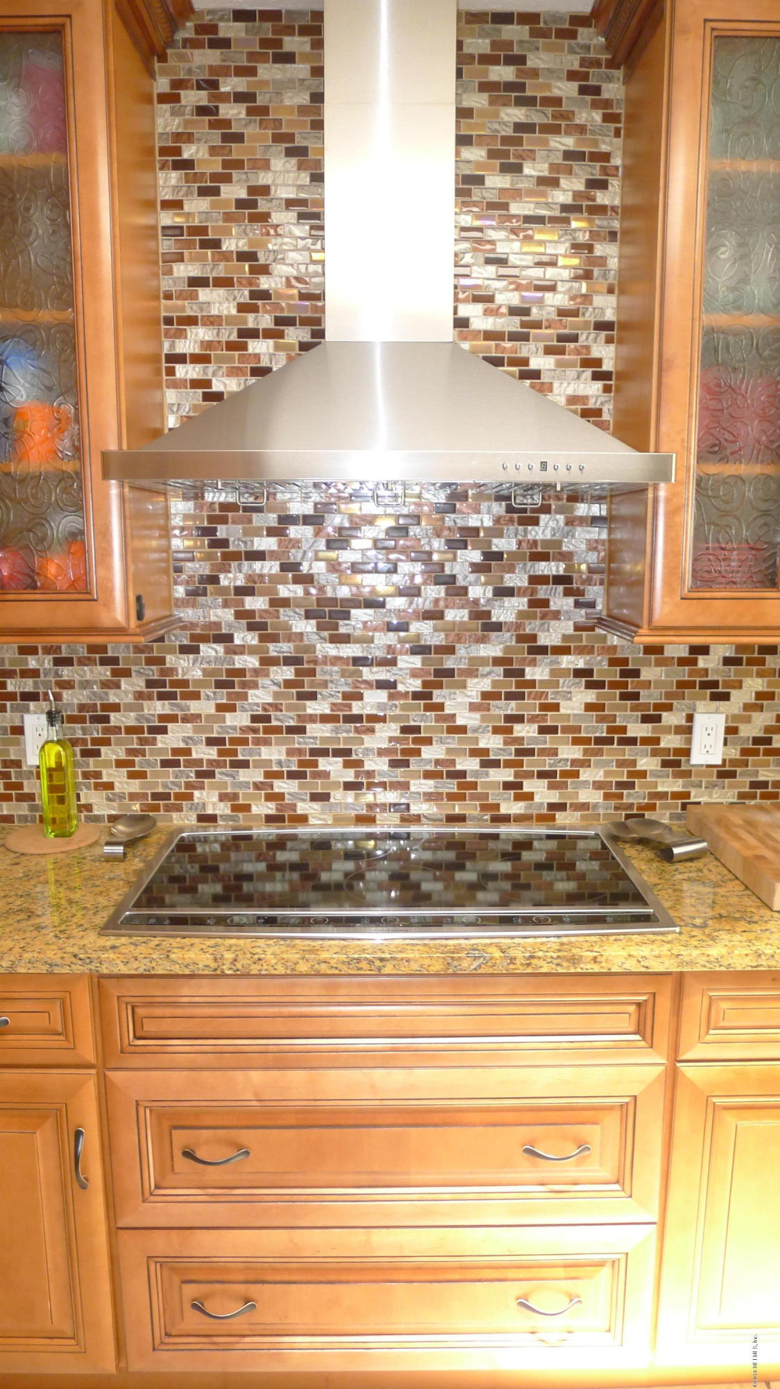 1923 W Road Jacksonville, FL 32216 - Photo 21 of 45 cooktop with gorgeous tile backsplash