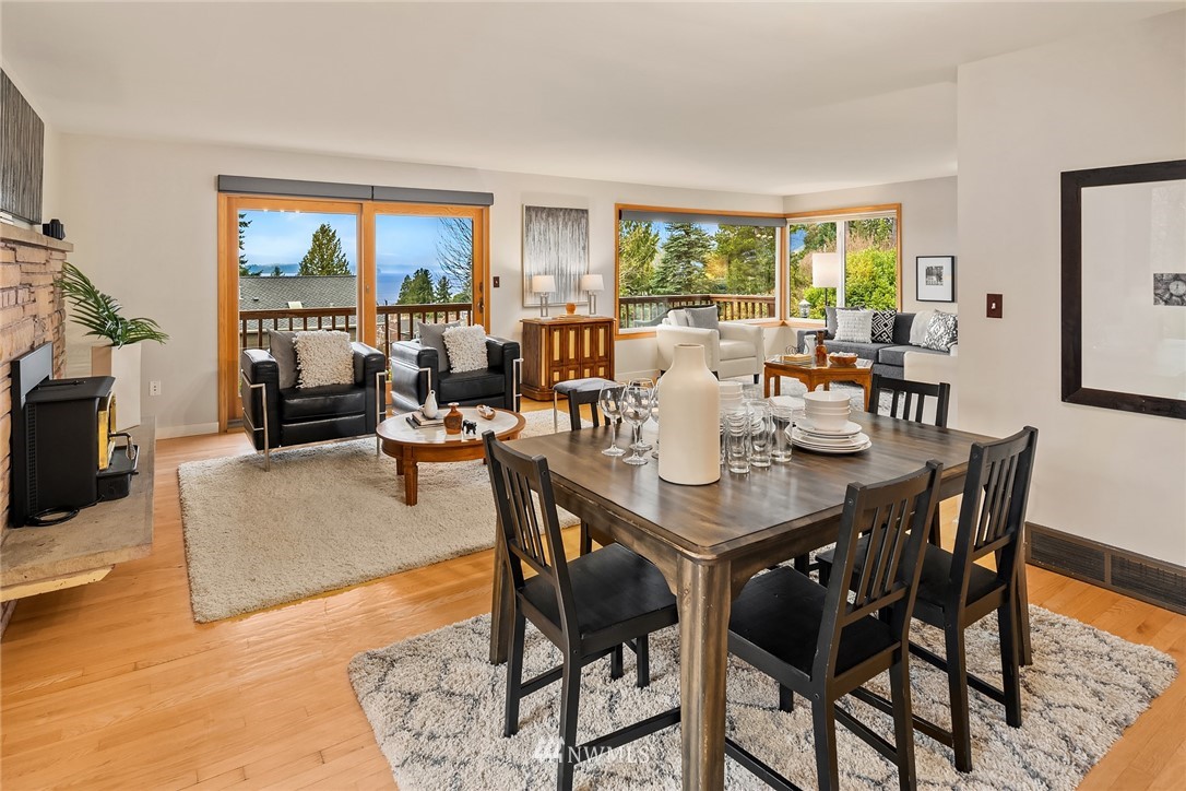 8750 Fauntlee Crest Southwest Seattle, WA 98136 - Photo 13 of 40 a view of a dining room with furniture