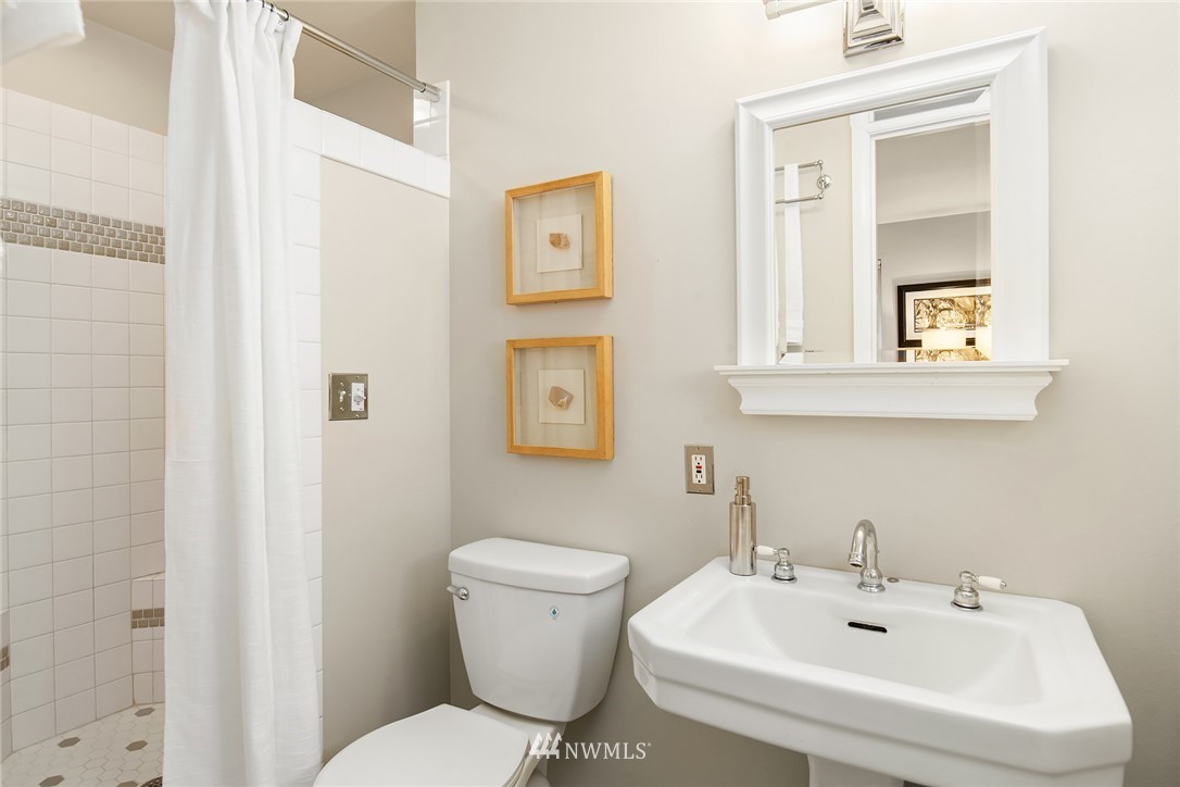 8750 Fauntlee Crest Southwest Seattle, WA 98136 - Photo 20 of 40 a bathroom with a sink and a toilet