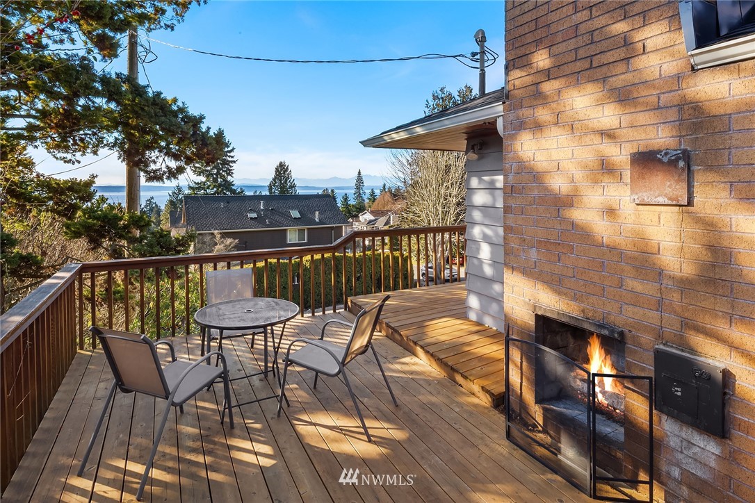 8750 Fauntlee Crest Southwest Seattle, WA 98136 - Photo 33 of 40 a view of a balcony with chairs