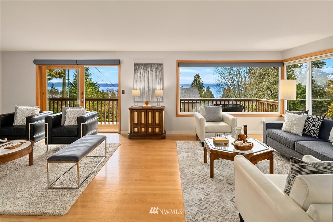 8750 Fauntlee Crest Southwest Seattle, WA 98136 - Photo 4 of 40 a living room with furniture and a large window
