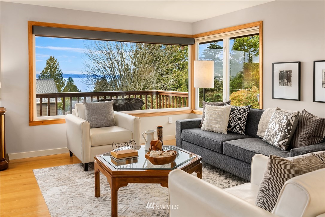 8750 Fauntlee Crest Southwest Seattle, WA 98136 - Photo 5 of 40 a living room with furniture and a large window