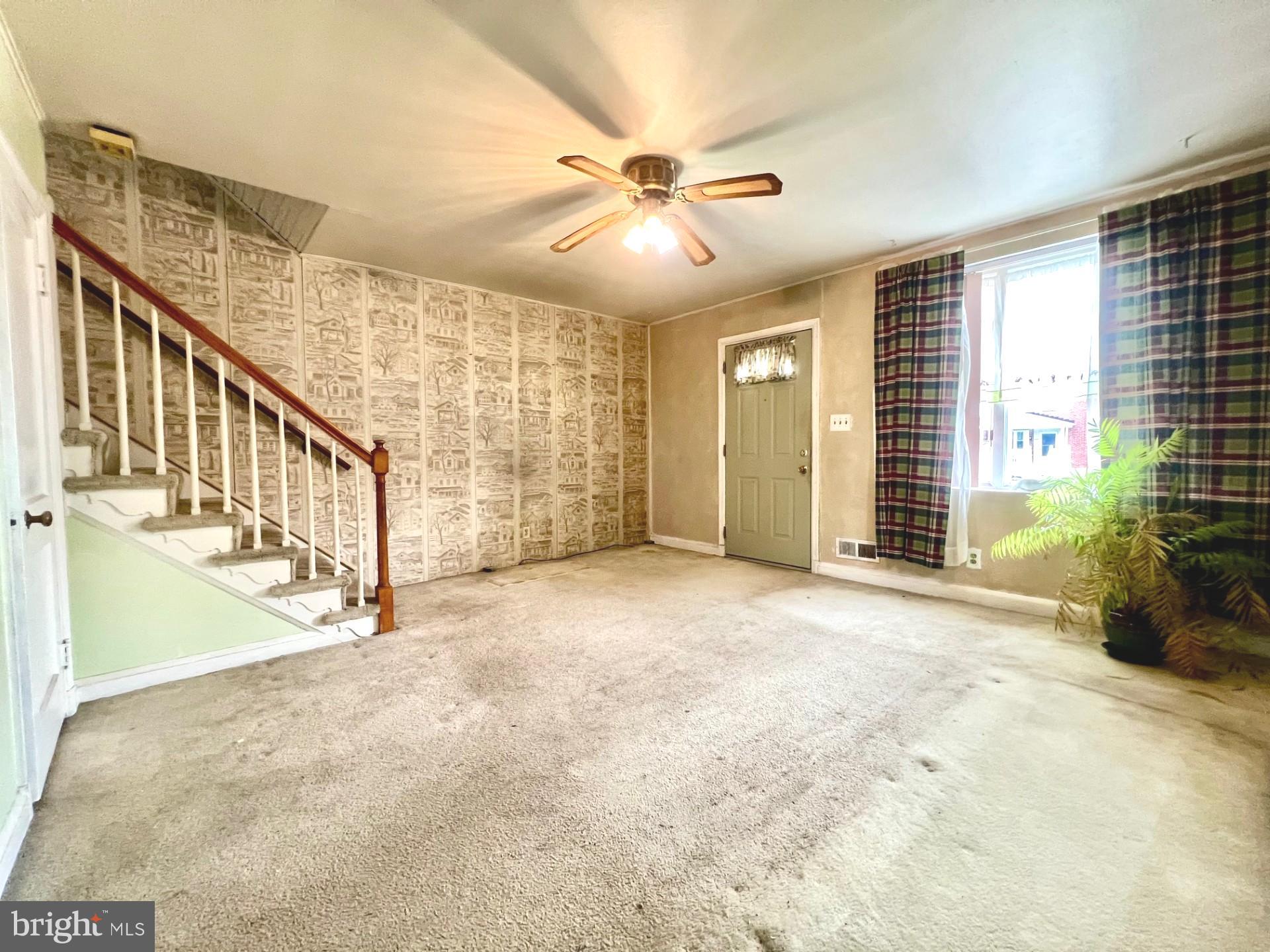 2801 Southbrook Road Baltimore, MD 21222 - Photo 2 of 26 a view of an entryway with wooden floor