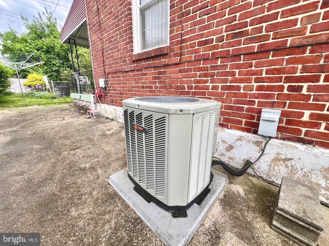2801 Southbrook Road Baltimore, MD 21222 - Photo 23 of 26 a view of a brick wall of building with a yard