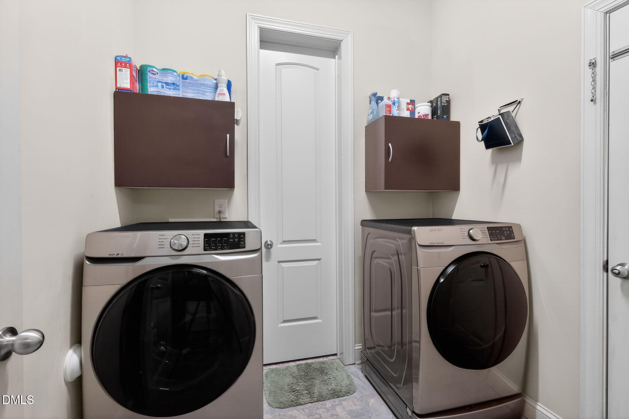 3428 Massey Pond Trail Raleigh, NC 27616 - Photo 20 of 39 a utility room with dryer and washer