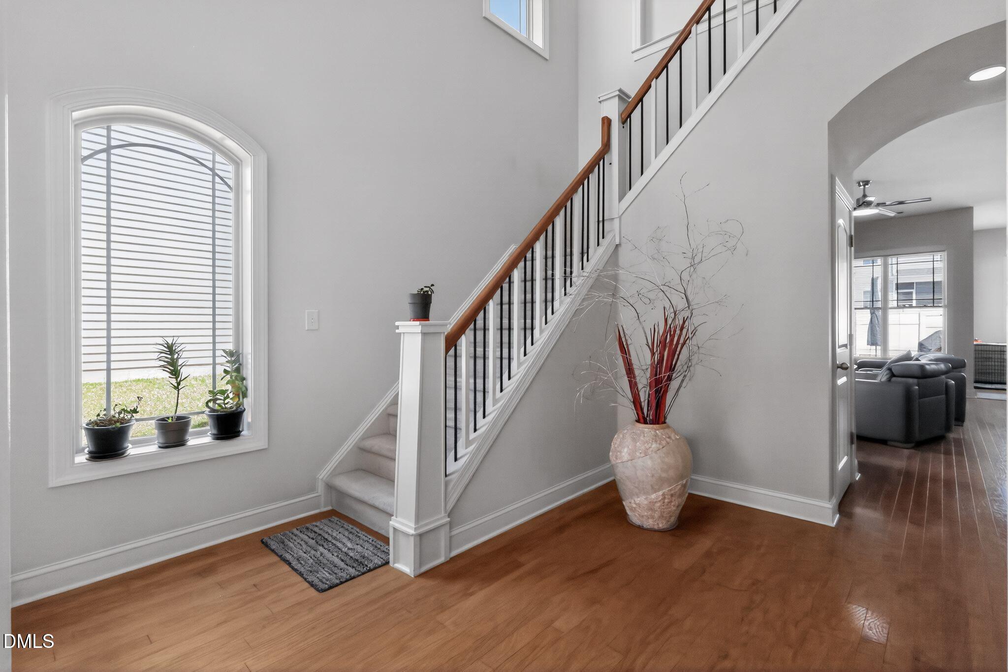 3428 Massey Pond Trail Raleigh, NC 27616 - Photo 21 of 39 a view of entryway and hall with wooden floor