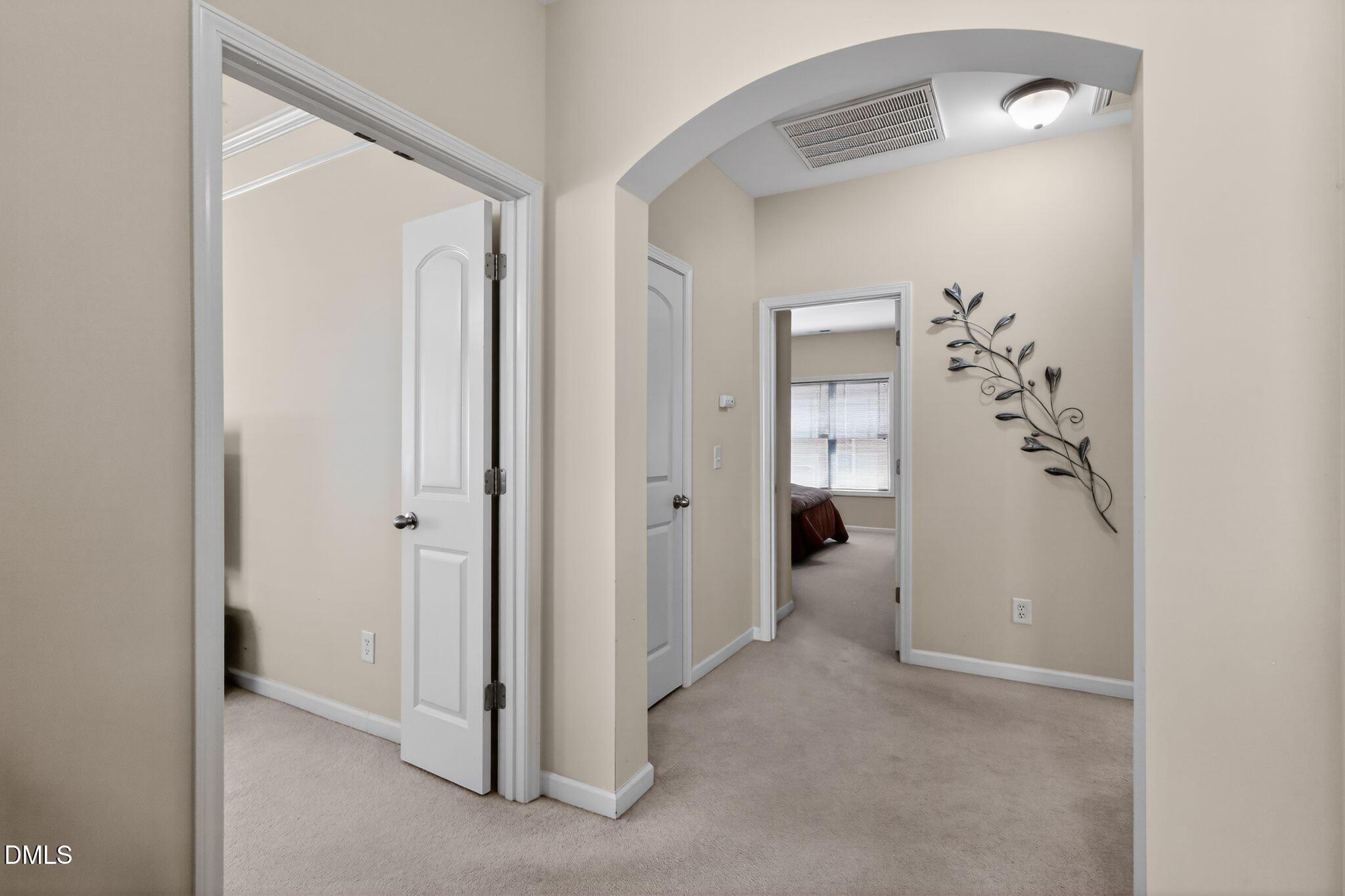 3428 Massey Pond Trail Raleigh, NC 27616 - Photo 22 of 39 a view of a hallway with closet and bathroom