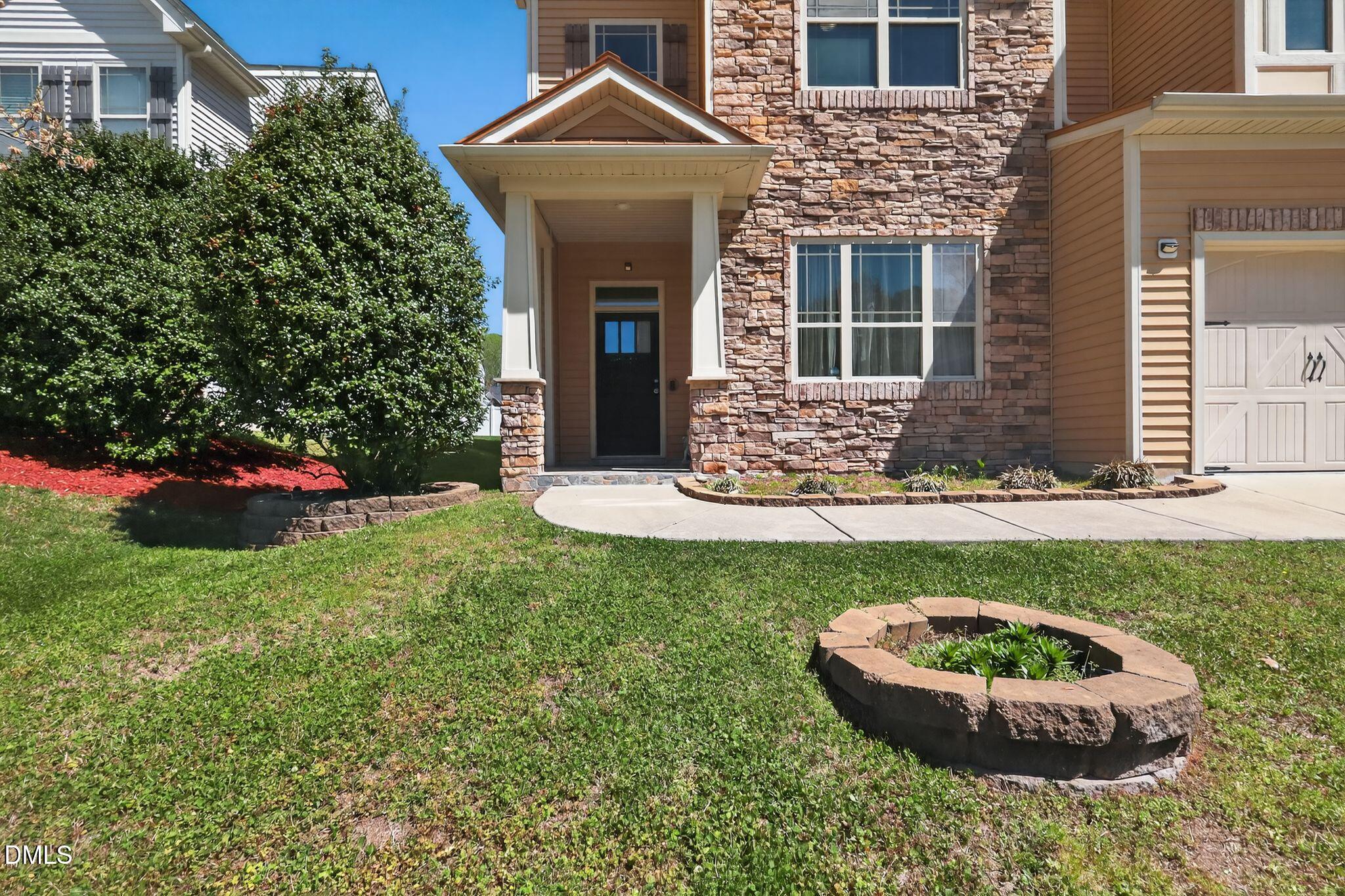 3428 Massey Pond Trail Raleigh, NC 27616 - Photo 2 of 39 front view of a house with a yard