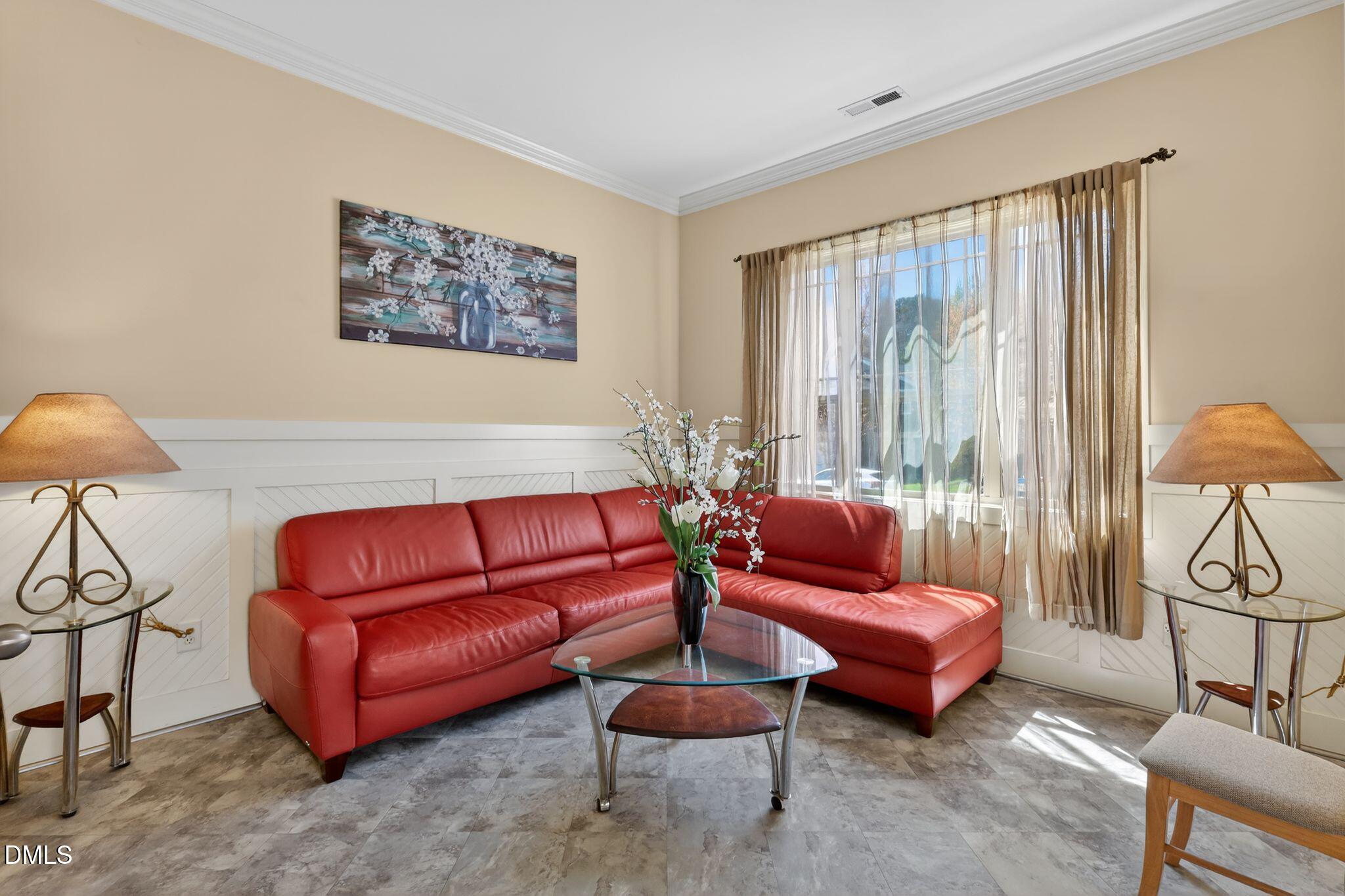 3428 Massey Pond Trail Raleigh, NC 27616 - Photo 6 of 39 a living room with furniture a rug and a large window