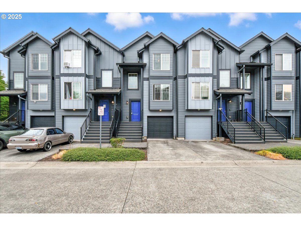 a front view of a houses on the street