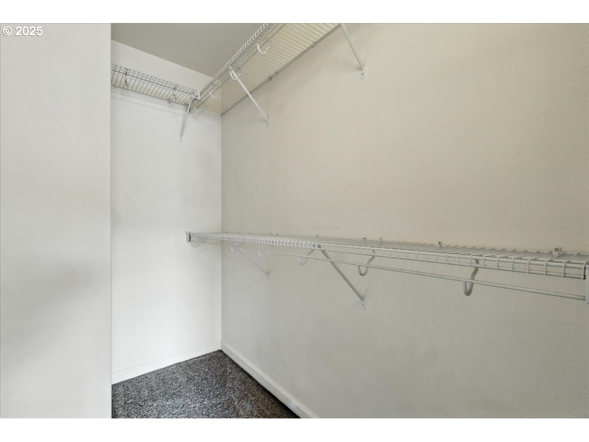 5927 Northeast 34th Street Vancouver, WA 98661 - Photo 21 of 29 a view of a room with racks on the wall