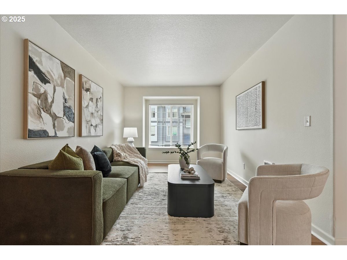5927 Northeast 34th Street Vancouver, WA 98661 - Photo 5 of 29 a living room with furniture and a large window