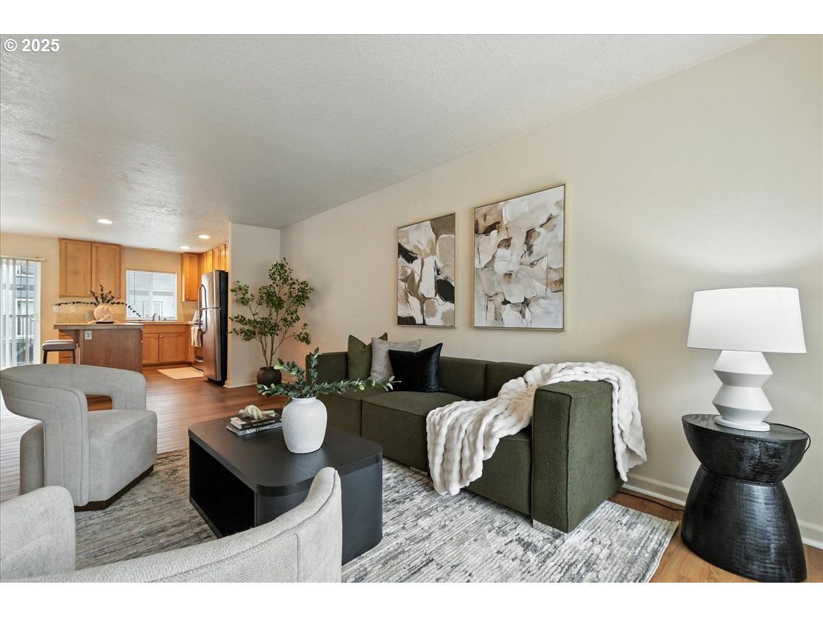 5927 Northeast 34th Street Vancouver, WA 98661 - Photo 6 of 29 a living room with furniture potted plant and a lamp