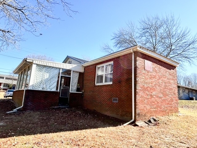 203 Glenhaven Road Paris, TN 38242 - Photo 32 of 42 a backyard of a house