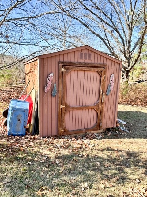 203 Glenhaven Road Paris, TN 38242 - Photo 35 of 42 a view of a backyard of the house