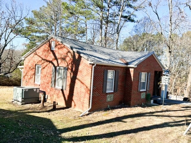 203 Glenhaven Road Paris, TN 38242 - Photo 38 of 42 a view of house with a outdoor space