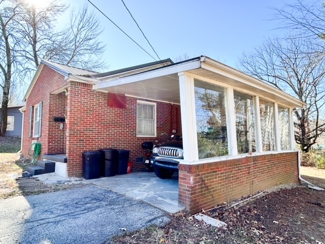203 Glenhaven Road Paris, TN 38242 - Photo 42 of 42 a view of a house with a cars park side of a road