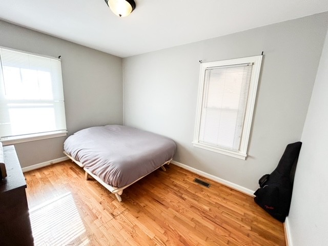 203 Glenhaven Road Paris, TN 38242 - Photo 5 of 42 a bedroom with a bed and a window