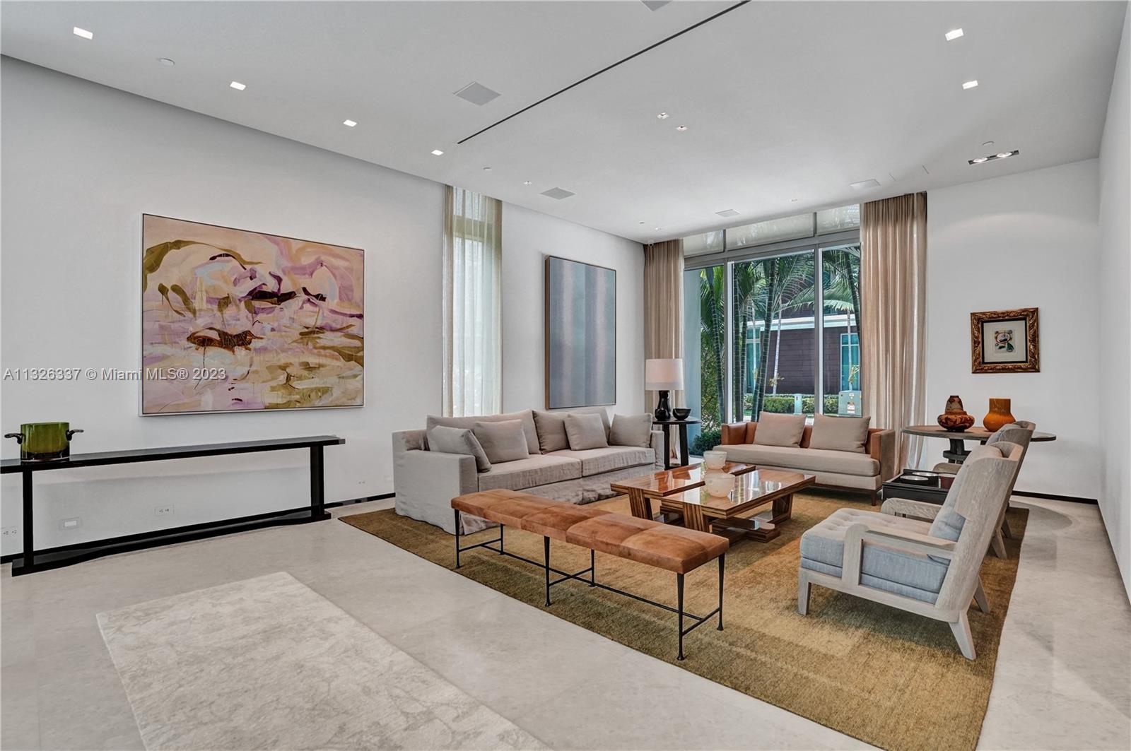 112 Reef Lane Key Biscayne, FL 33149 - Photo 17 of 41 a living room with furniture and large window