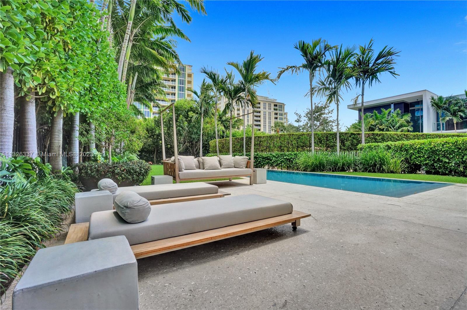 112 Reef Lane Key Biscayne, FL 33149 - Photo 27 of 41 a view of outdoor space yard and patio