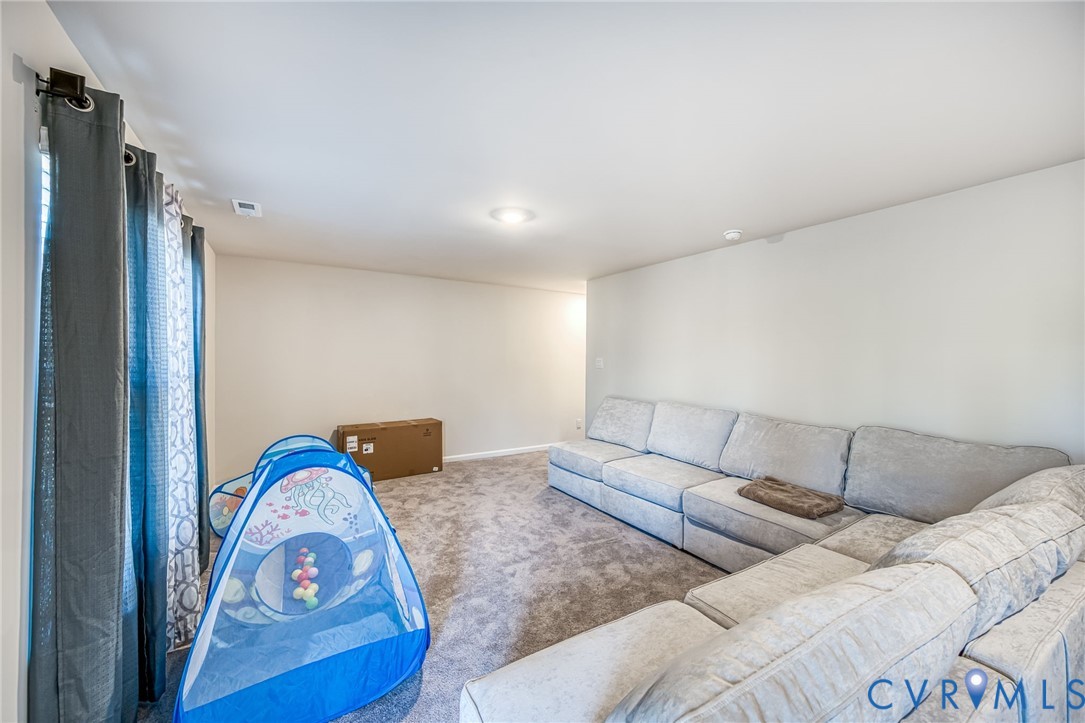 116 Leonard Way Aylett, VA 23009 - Photo 29 of 36 a living room with furniture